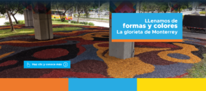Paisajismo urbano con mulch de colores y vegetación ornamental en la glorieta Monterrey de Medellín.